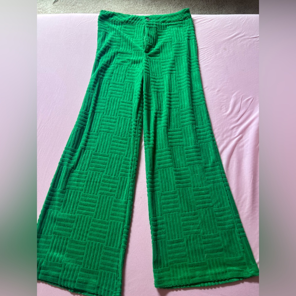 Shop cider green flare pants